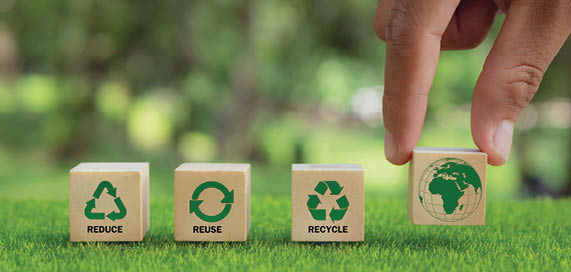 hand arranged wooden cube block over reduce, reuse and recycle text for save world, environmental concept